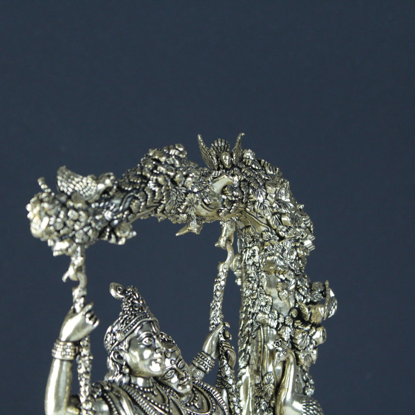 Close up shot of brass radha krishna statue