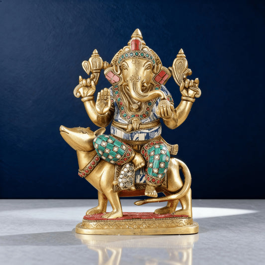 decorative brass ganesha statue with gemstone detailing