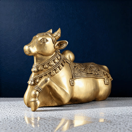 Handcrafted brass Nandi statue in a seated pose with intricate detailing