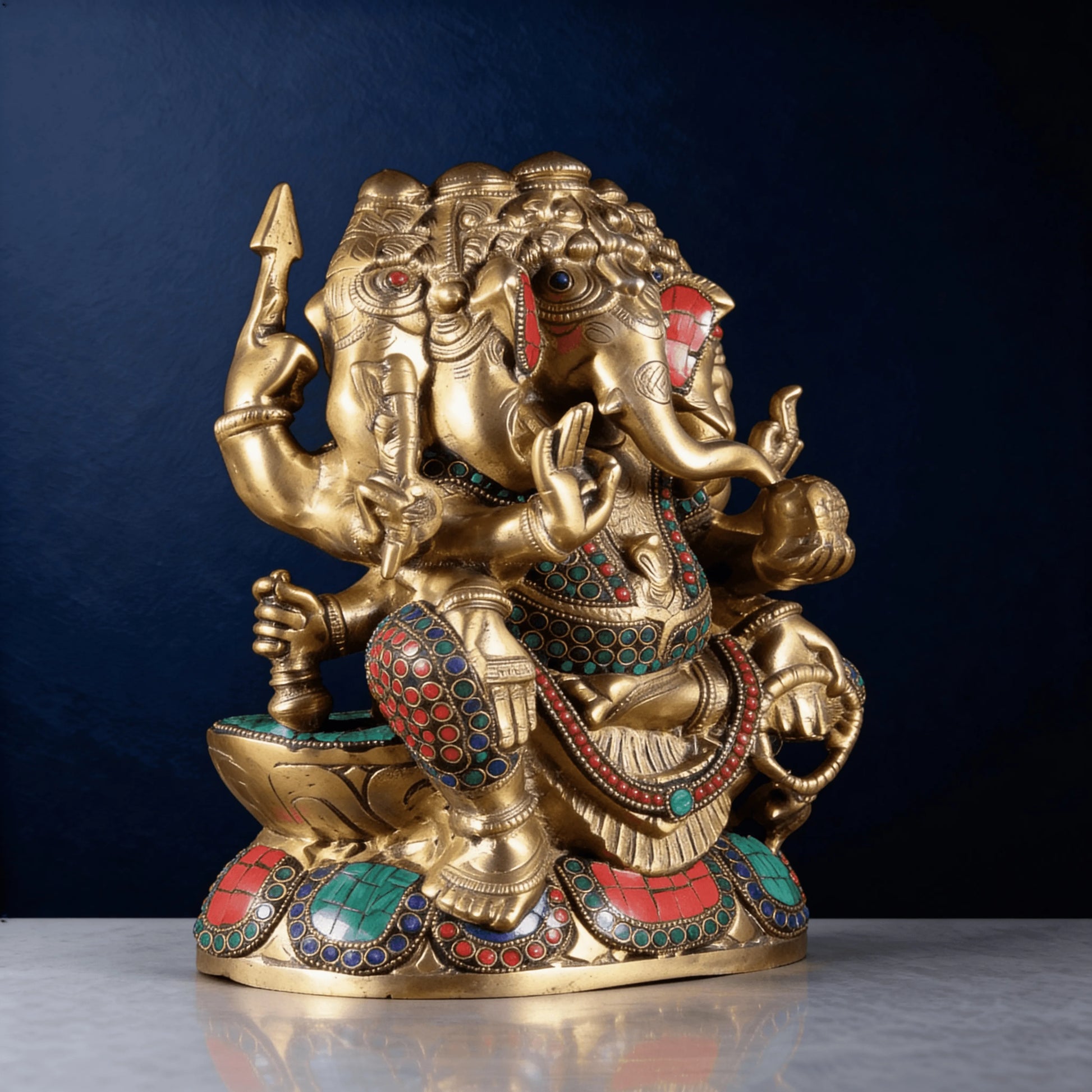 side angle brass ganesha statue handcrafted with gemstone inlay