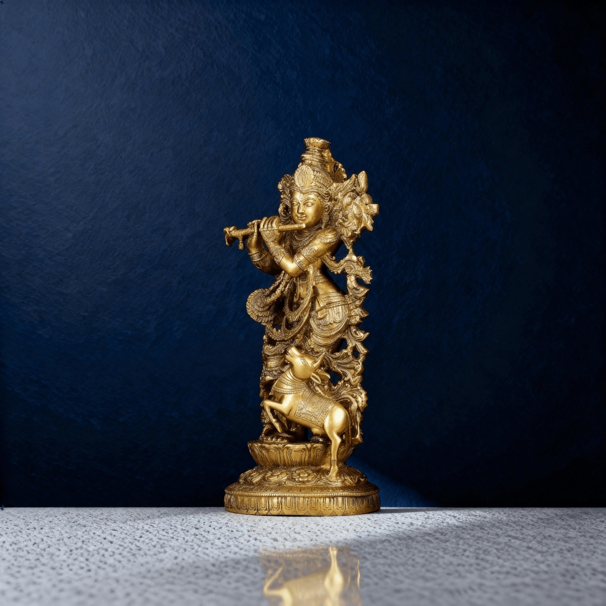 Side view of brass Krishna statue with detailed flute pose and ornate carvings, artisan-made for timeless display