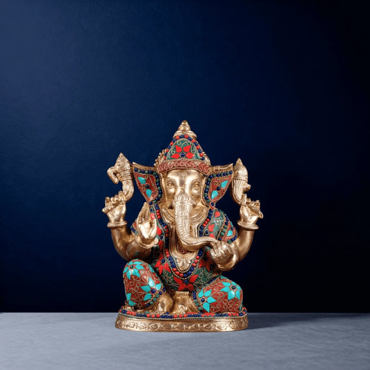 Centered front shot of multicolor stone inlay brass Ganesha statue