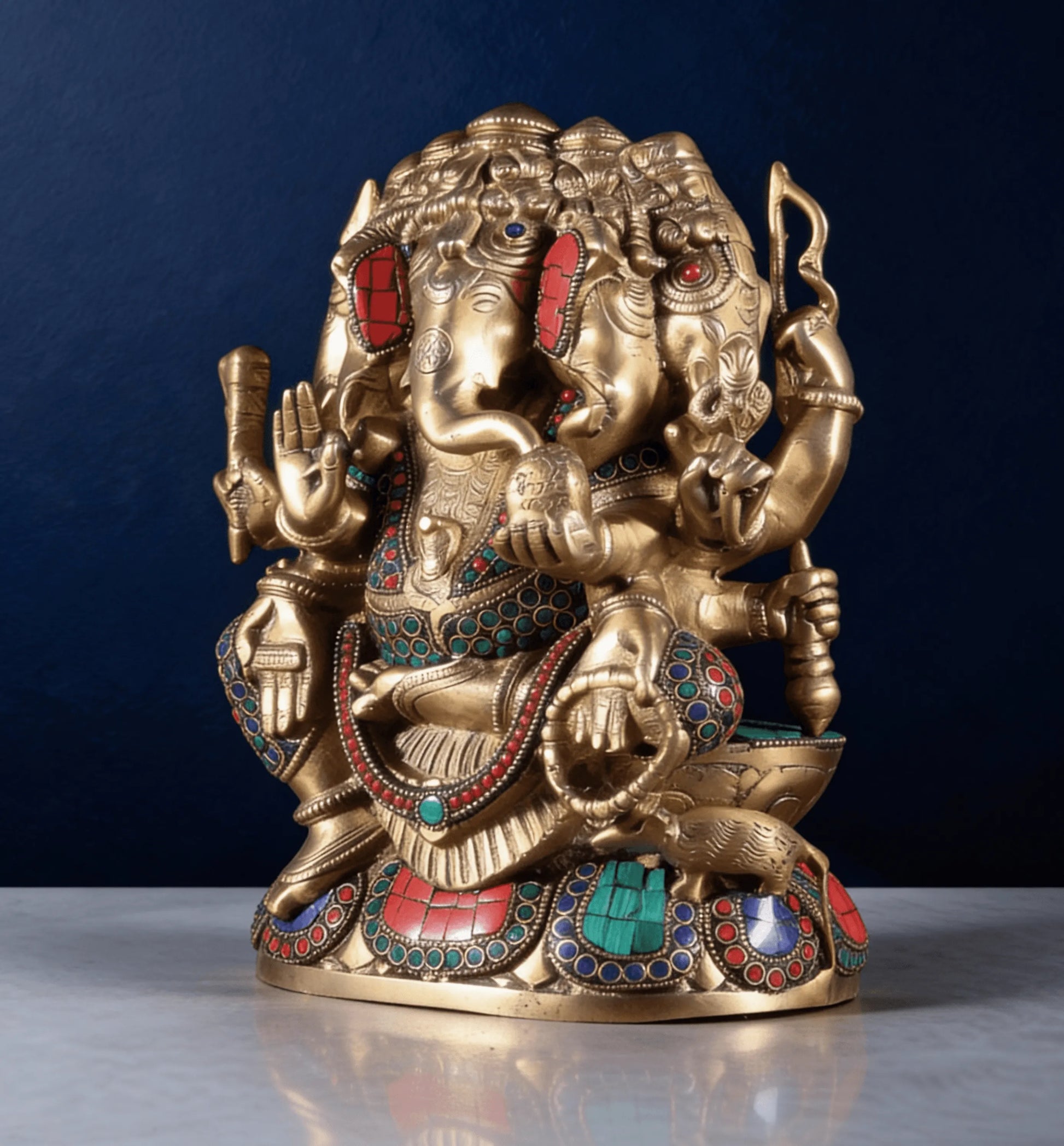 front view brass ganesha statue with multicolor stone work