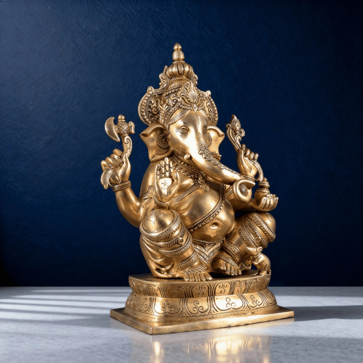 brass ganesha statue side angle traditional design