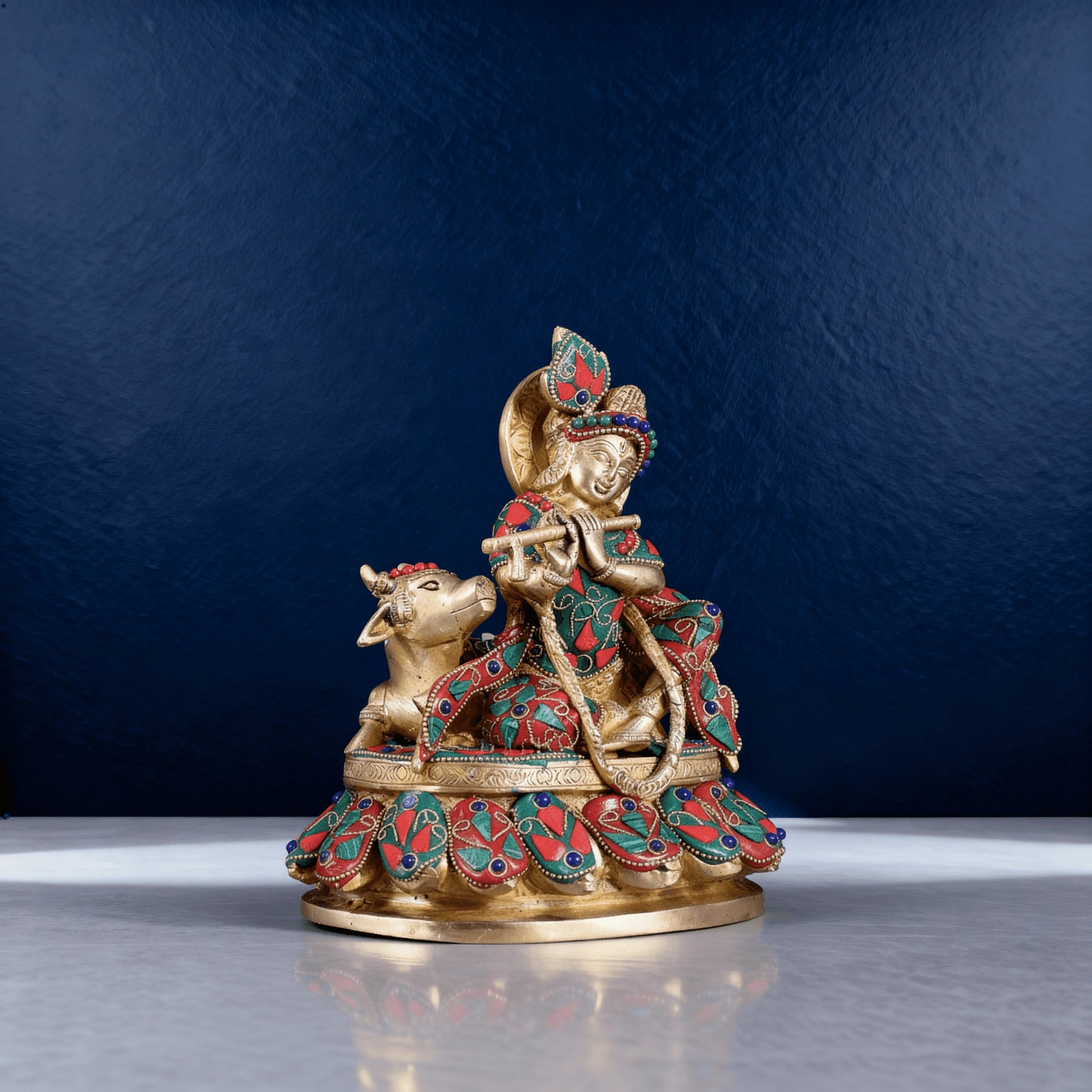 Pure brass Krishna statue with colorful meenakari work, shown with cow figure, detailed left angle.