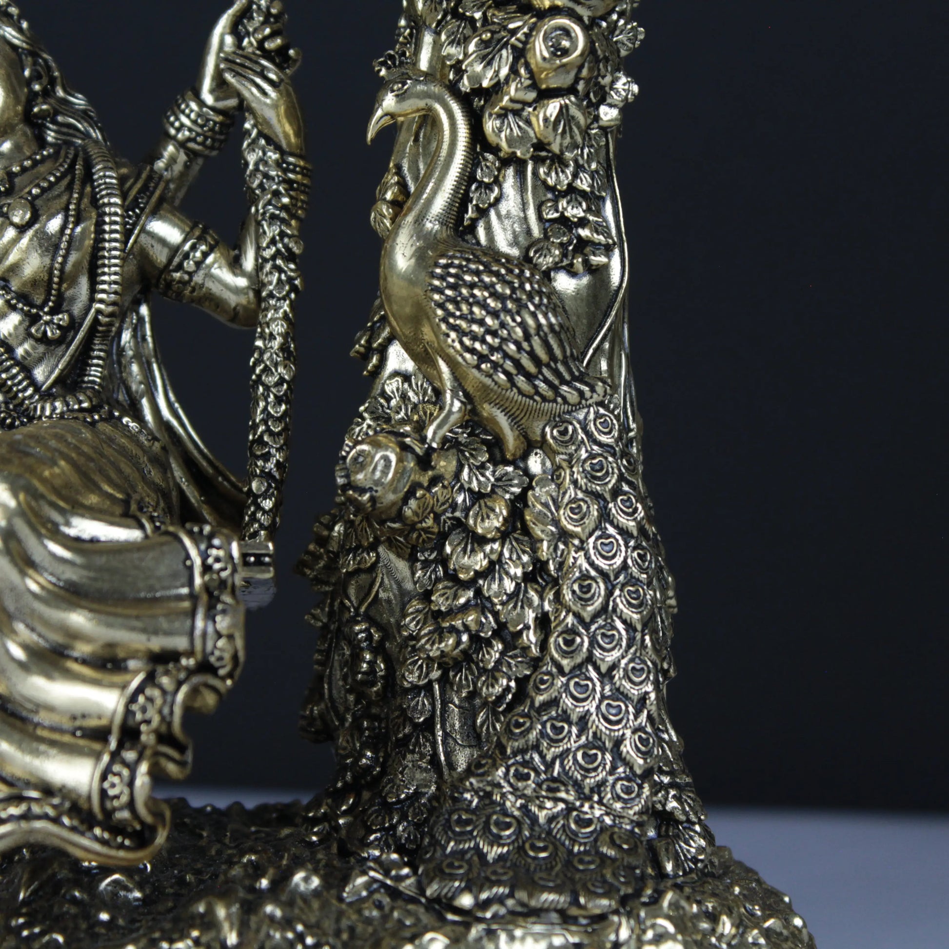 Brass close up shot of Radha Krishna idol