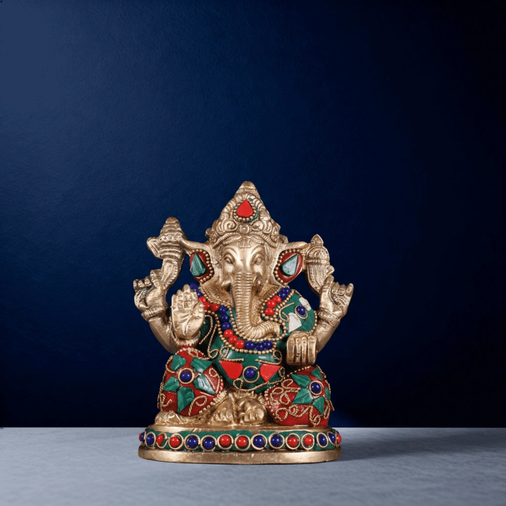 Front-facing brass Ganesha statue with vibrant multicolor stone inlay