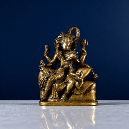Brass Shiva Parvati murti front angle on marble background