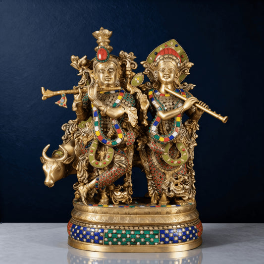Close-up of handcrafted Radha Krishna brass statue with flute, vibrant enamel detailing, and cow – Indian pooja room decor