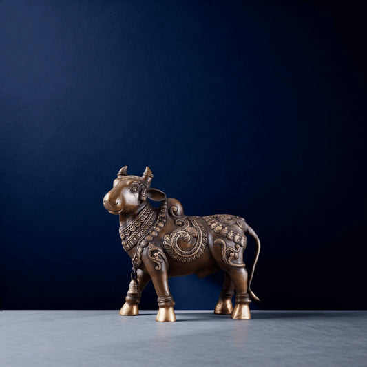 antique style brass nandi sculpture with ornate carvings and temple-inspired detailing