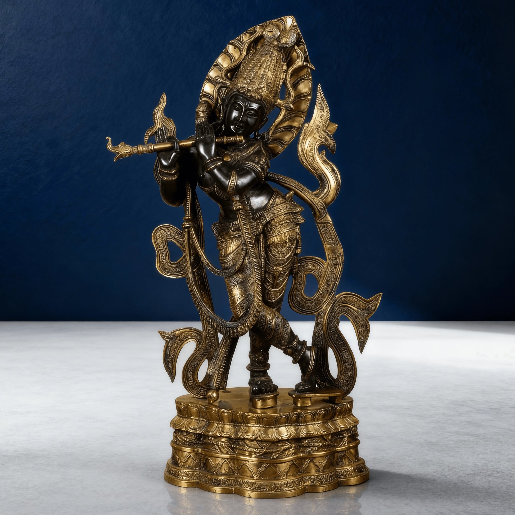 Brass Krishna murti with flute and decorative aureole – full statue left angle product photo