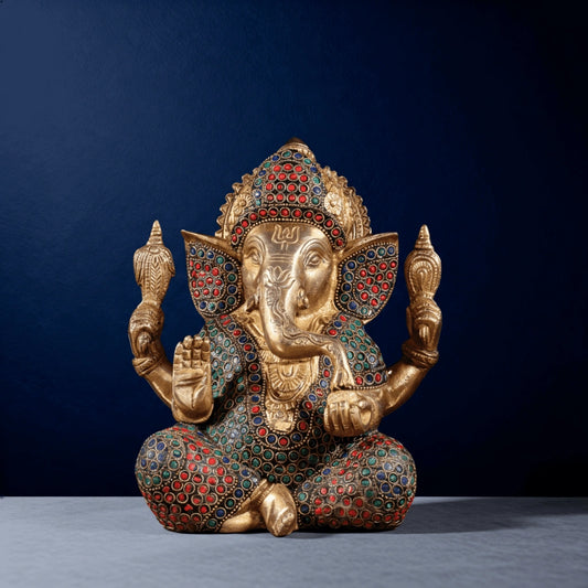 Front view of handcrafted meenakari brass Ganesha murti with vibrant stone inlay and fine ornamental detailing