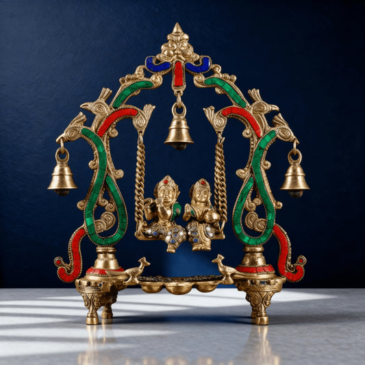 Side angle of colourful brass Radha Krishna swing idol with enamel artwork