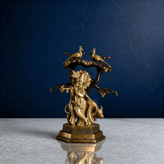 Decorative brass Krishna murti with flute, cow, and tree – Indian religious statue for pooja or gifting
