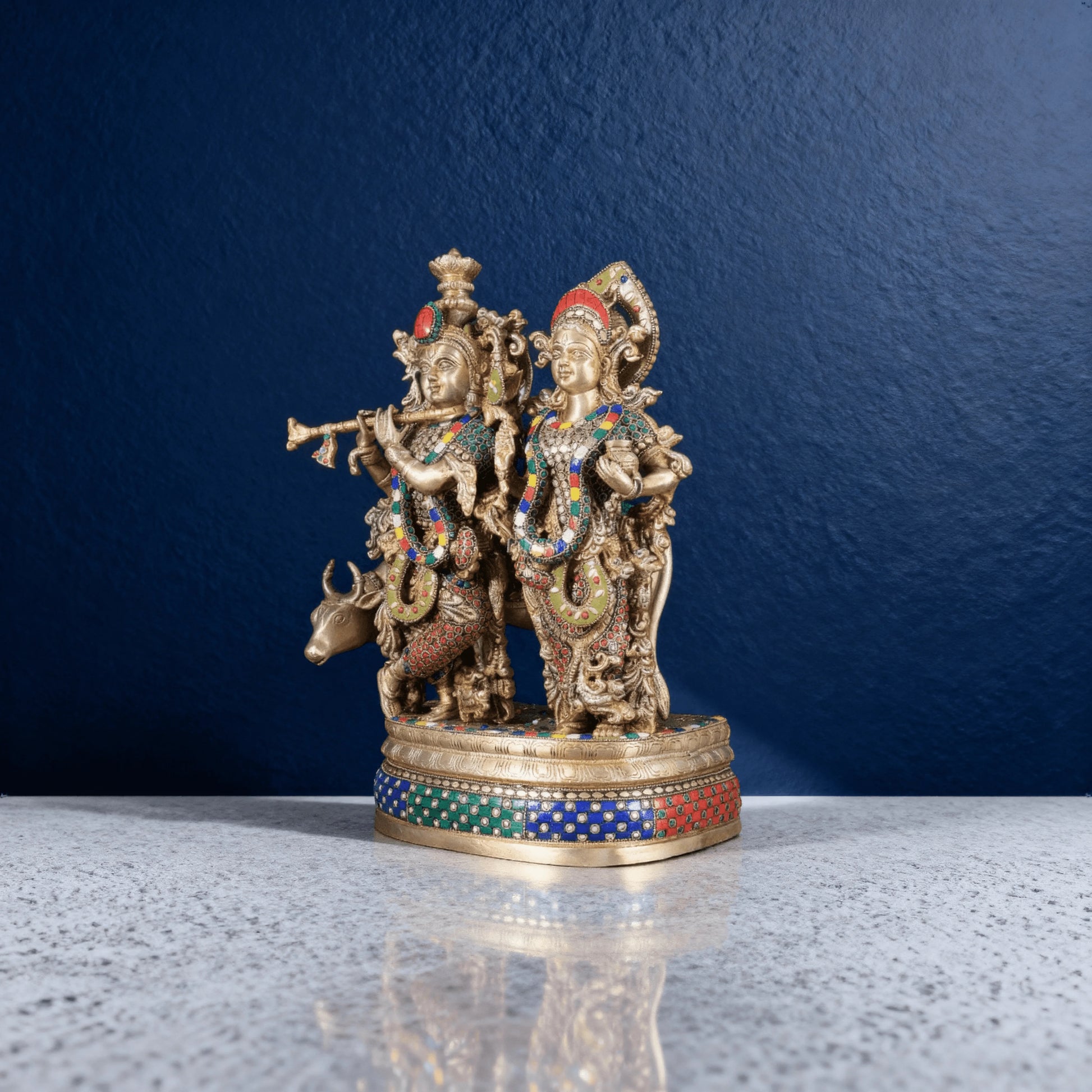 Side angle of Radha Krishna murti with intricate meenakari work and cow – brass Hindu figurine for gifting and worship