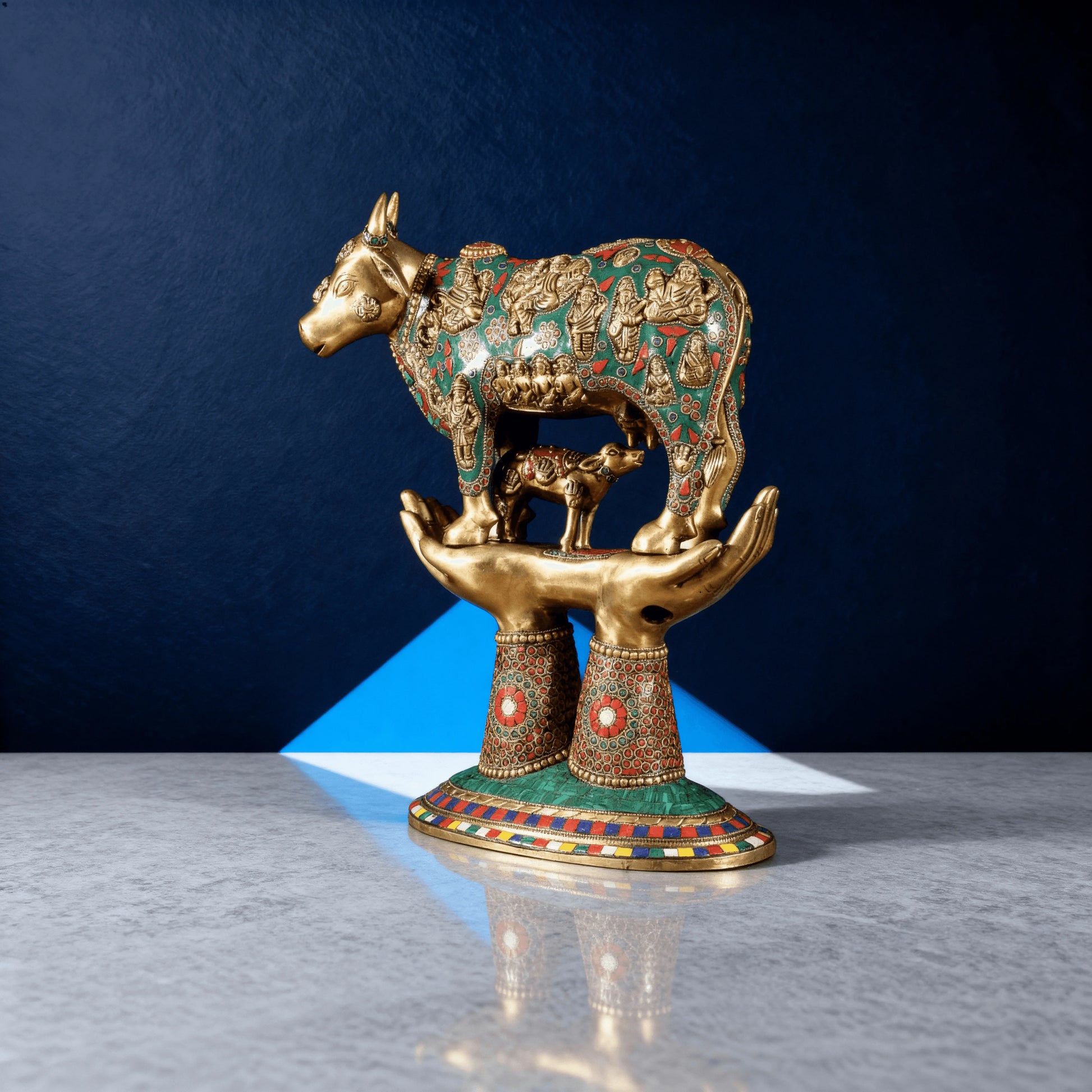 Traditional Kamadhenu cow sculpture with intricate meenakari and symbolic deities – brass Indian decor for housewarming
